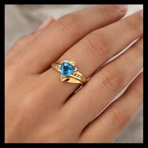 VINTAGE DESIGNER LGL 10K GOLD TRILLION CUT TOPAZ CREATED 
DIAMOND WAVE BAND
RING